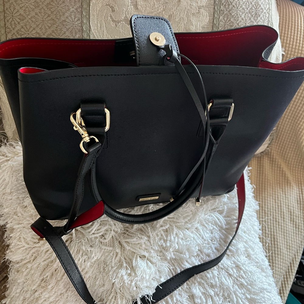 Stylish Black Tote Bag with Red Interior